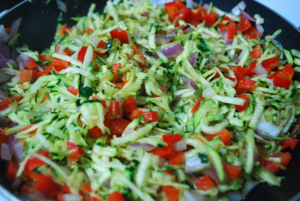 All the chopped vegetables and cumin mixed together for the Zucchini Quesadillas