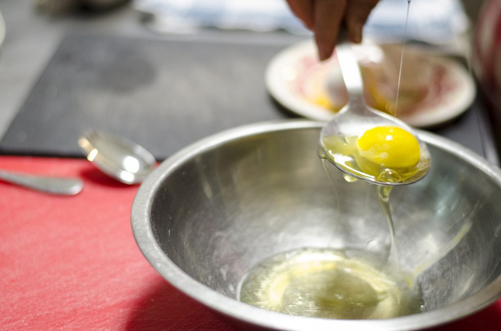 Separate the egg while from the yolk.