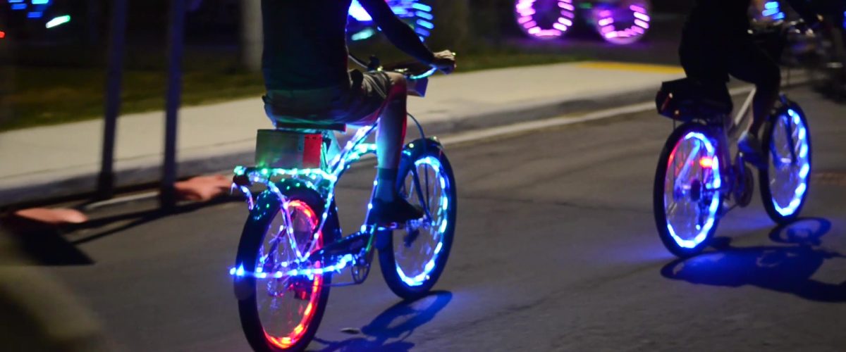 Friday Night Lights is a colourful, nighttime "pub crawl" on bike in Windsor, Ontario.