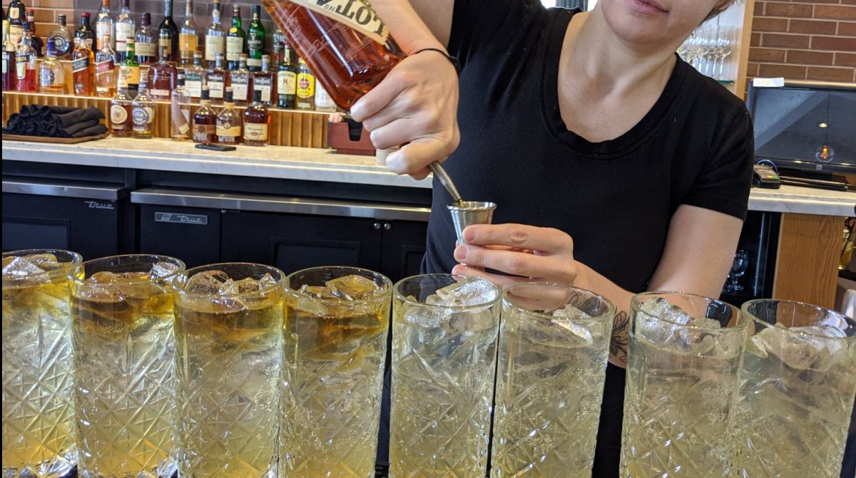 Enjoying cocktails at the private member club, The Windsor Club, on the Drinks of Walkerville tour in Windsor, Ontario.