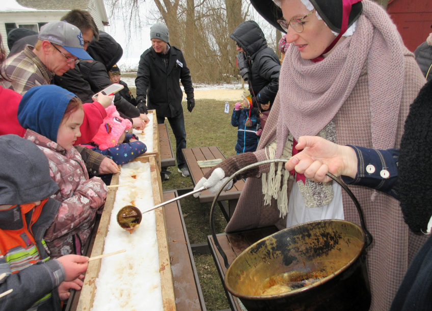 The Maple Syrup Festival in Colchester, Ontario, is a family fun activity.