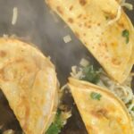 Birria Tacos on the grill at the Rico Taco food truck in Windsor, Ontario.